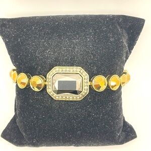 Heidi Daus Signed Gold Tone Metallic Amber Hematite Rhinestone Bracelet 8"